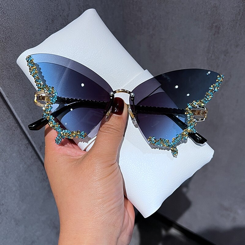 biggersourcing-_Fashion_Luxury Diamond Butterfly Sunglasses Women Brand Y2K Vintage Rimless Oversized Sun Glasses Ladies Eyewear_Provide you to purchase, logistics, monitoring, inspection, factories and other service providers in China_First1Open